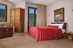 karpenisi-forest-suites-red-juior-suite-bedroom-view